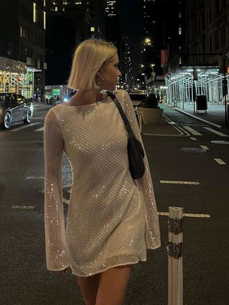 Deep Discounts comfy dressBella - Sparkling dress with open back